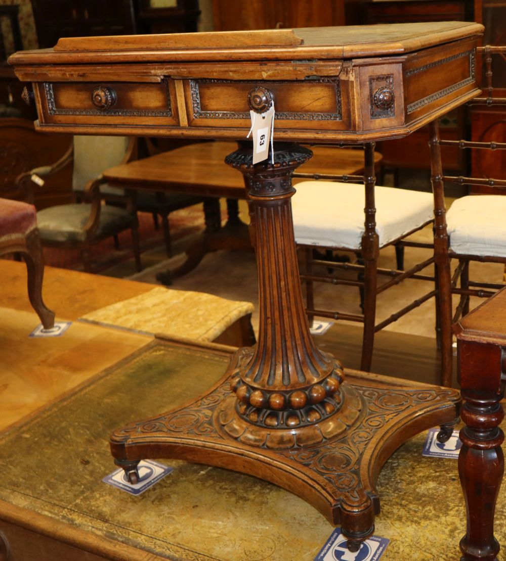 A Victorian carved walnut writing-cum-reading table, W.64cm, D.48cm, H.77cm